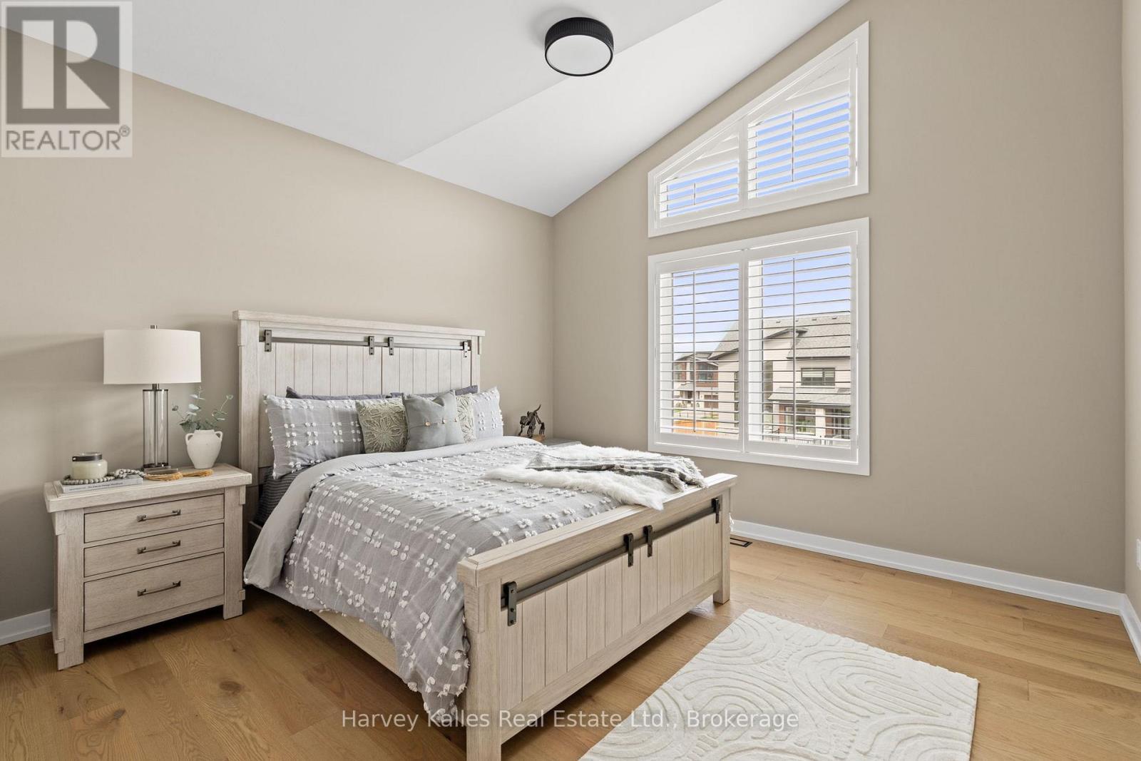 Large Bedroom 3 with huge windows - 163 Springside Crescent, Blue Mountains, ON - Indoor Photo Showing Bedroom