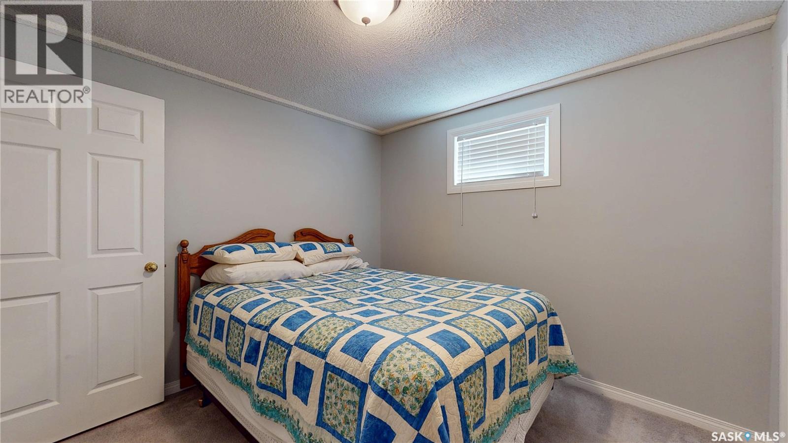 1015 Graham Road, Regina, SK - Indoor Photo Showing Bedroom