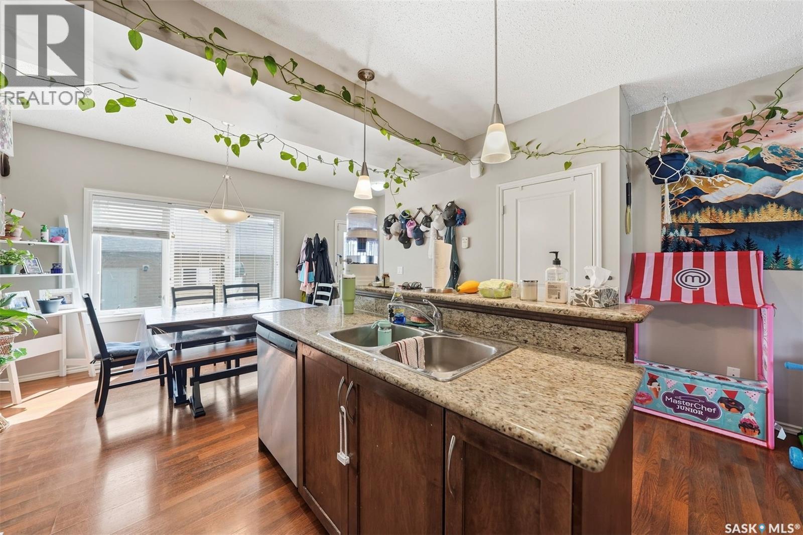 150 Lynd Crescent, Saskatoon, SK - Indoor Photo Showing Kitchen With Double Sink