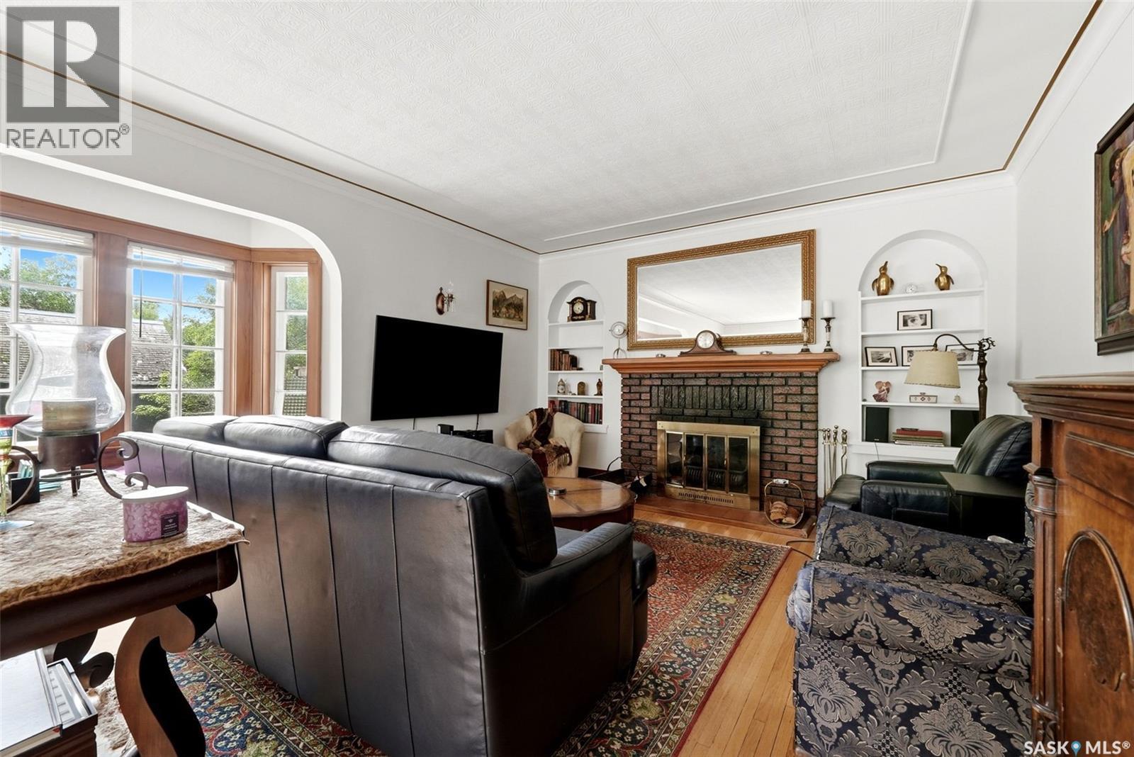 2700 19Th Avenue, Regina, SK - Indoor Photo Showing Living Room With Fireplace