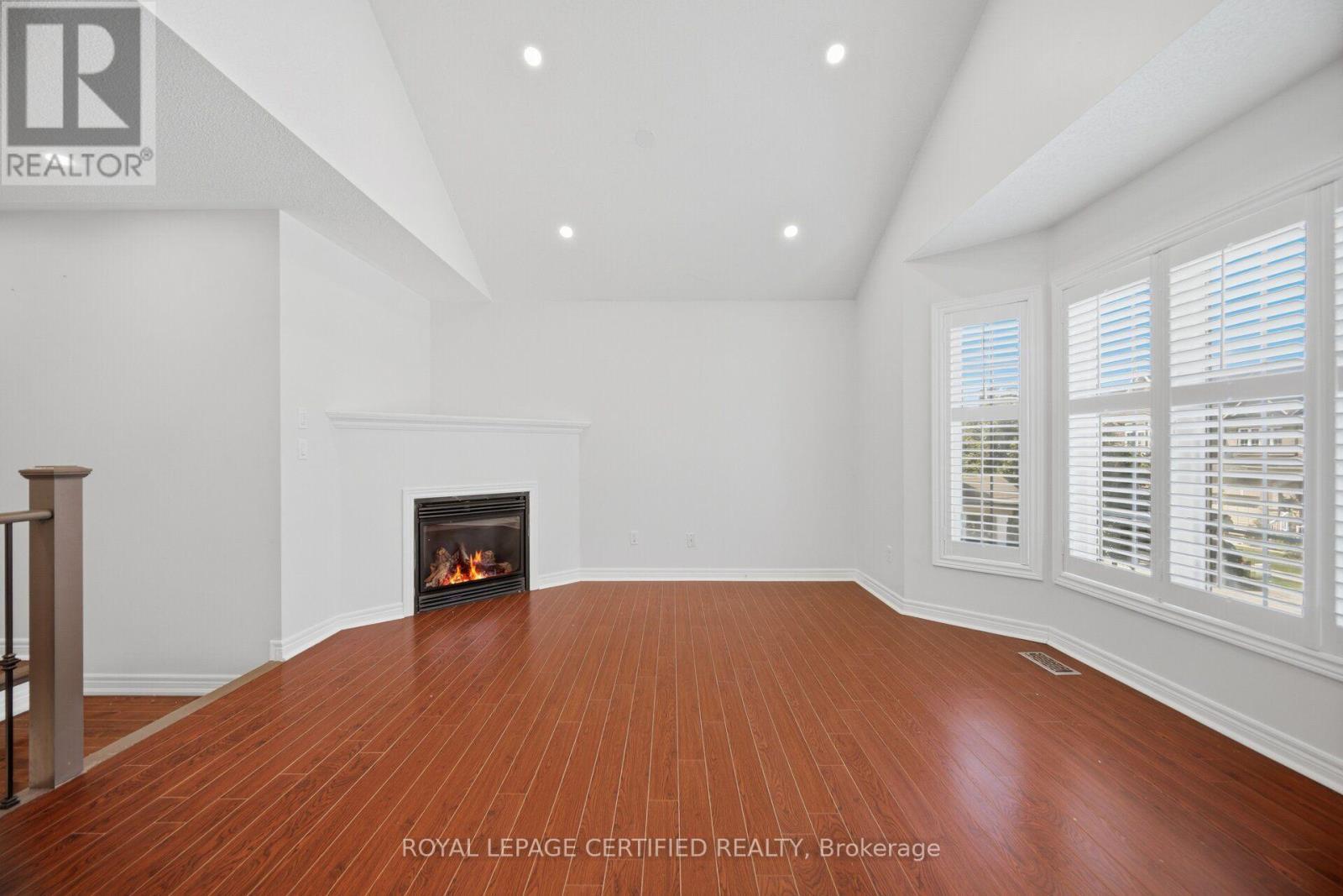 426 Black Drive, Milton, ON - Indoor Photo Showing Other Room With Fireplace