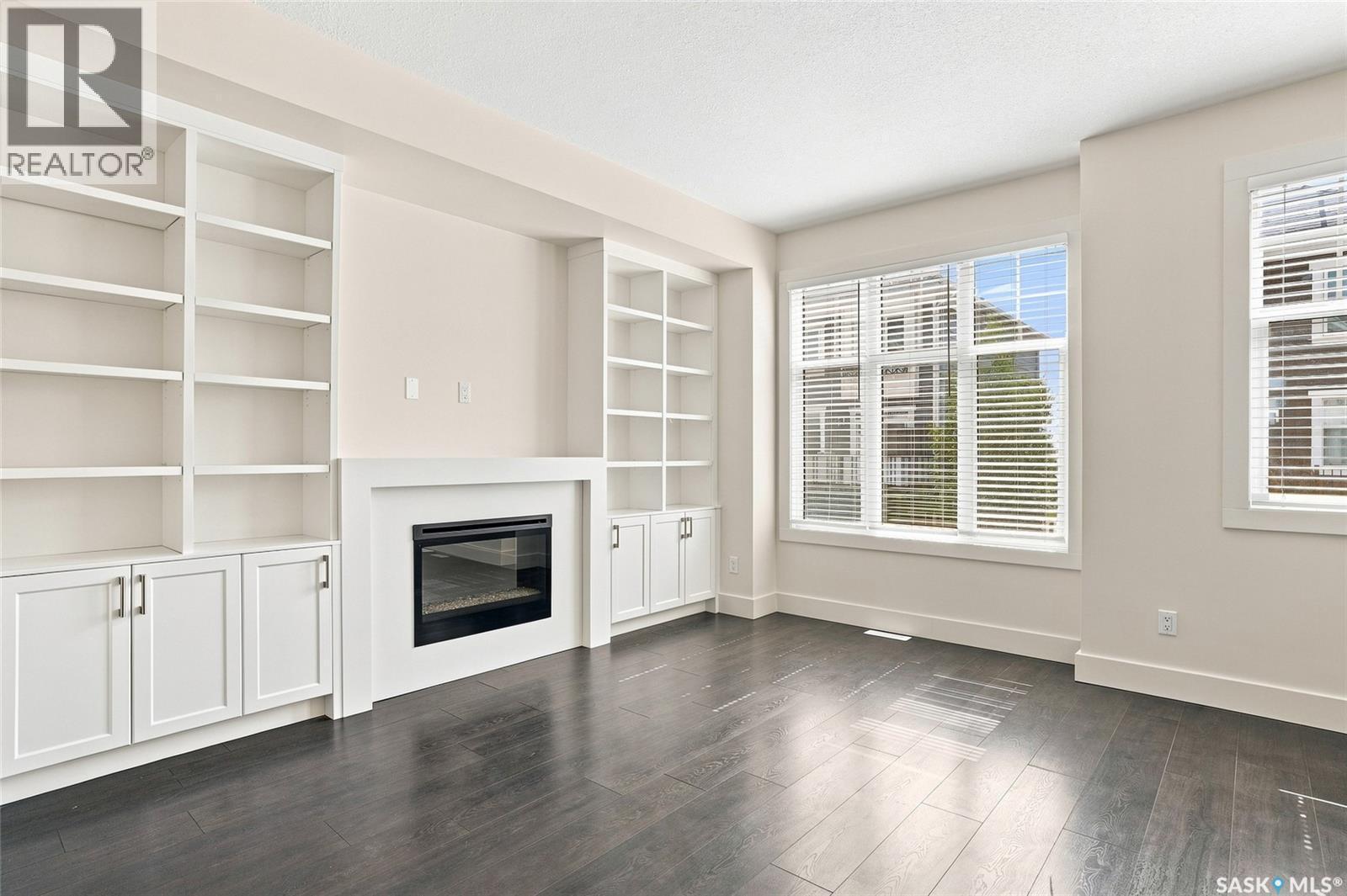 724 701 Meadows Boulevard, Saskatoon, SK - Indoor With Fireplace