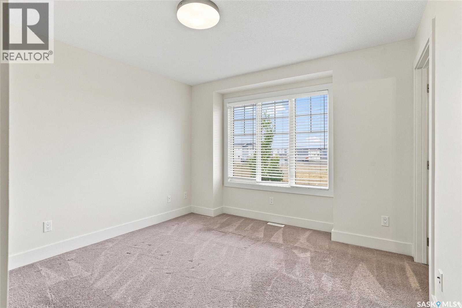 724 701 Meadows Boulevard, Saskatoon, SK - Indoor Photo Showing Other Room