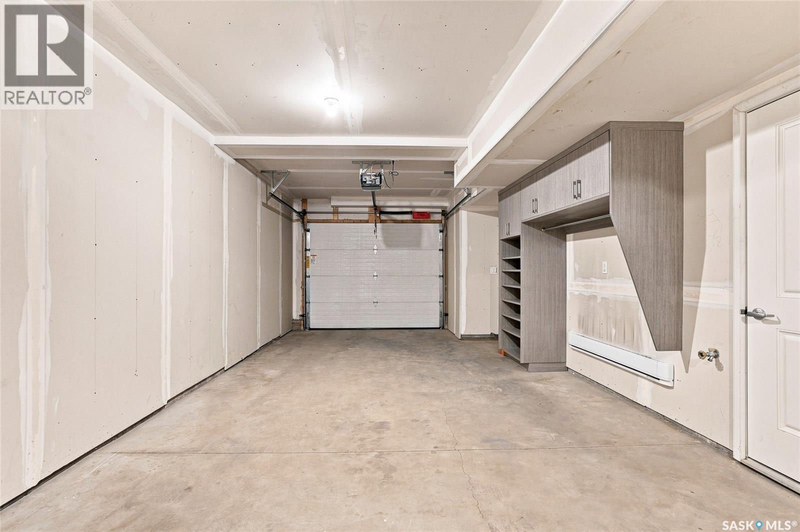 724 701 Meadows Boulevard, Saskatoon, SK - Indoor Photo Showing Garage