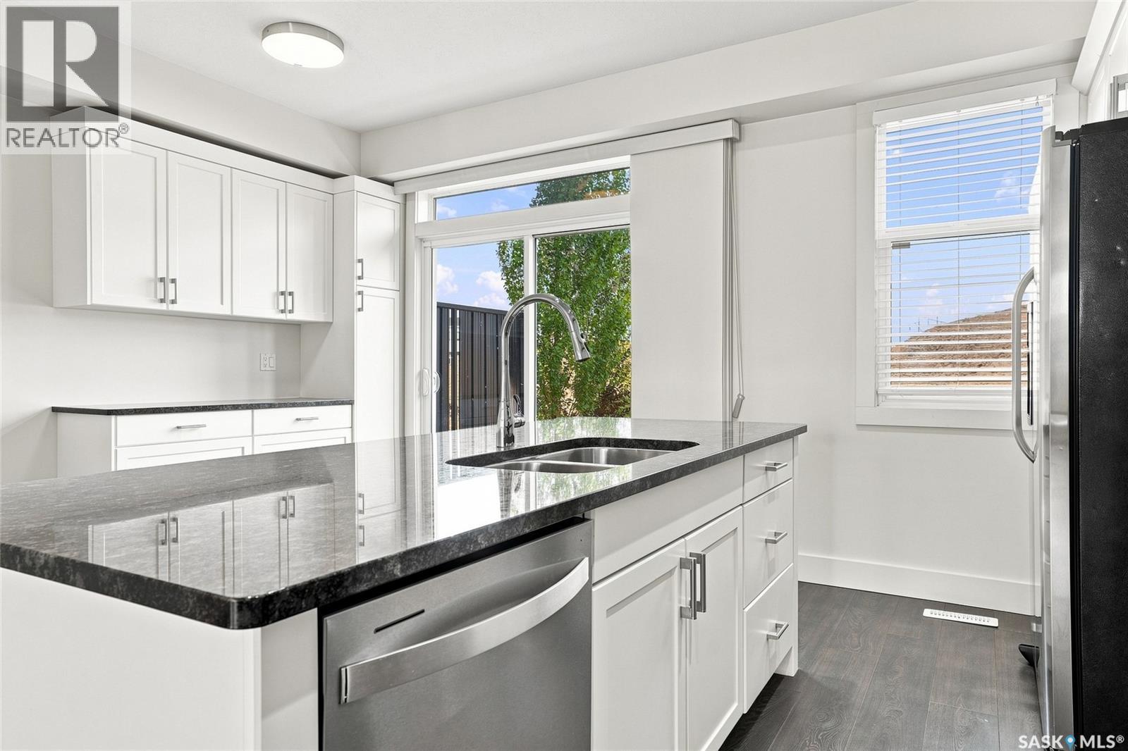 724 701 Meadows Boulevard, Saskatoon, SK - Indoor Photo Showing Kitchen With Double Sink