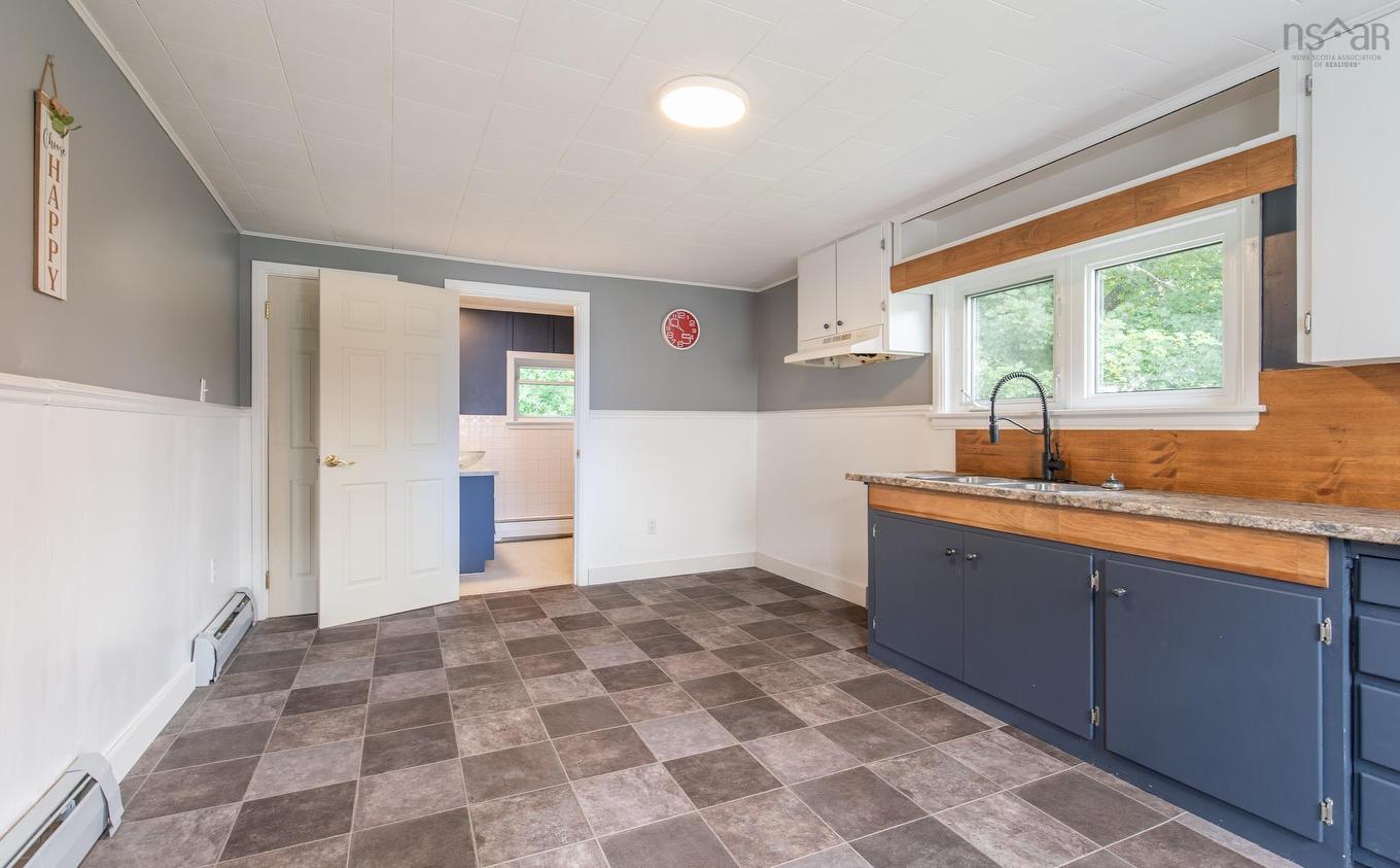 102 Parade Street, Yarmouth, NS - Indoor Photo Showing Kitchen With Double Sink