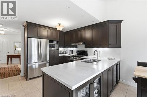 64 Redfern Avenue, Hamilton, ON - Indoor Photo Showing Kitchen With Double Sink