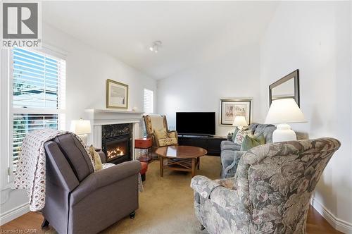 64 Redfern Avenue, Hamilton, ON - Indoor Photo Showing Living Room With Fireplace