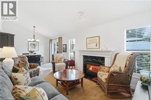 64 Redfern Avenue, Hamilton, ON - Indoor Photo Showing Living Room With Fireplace