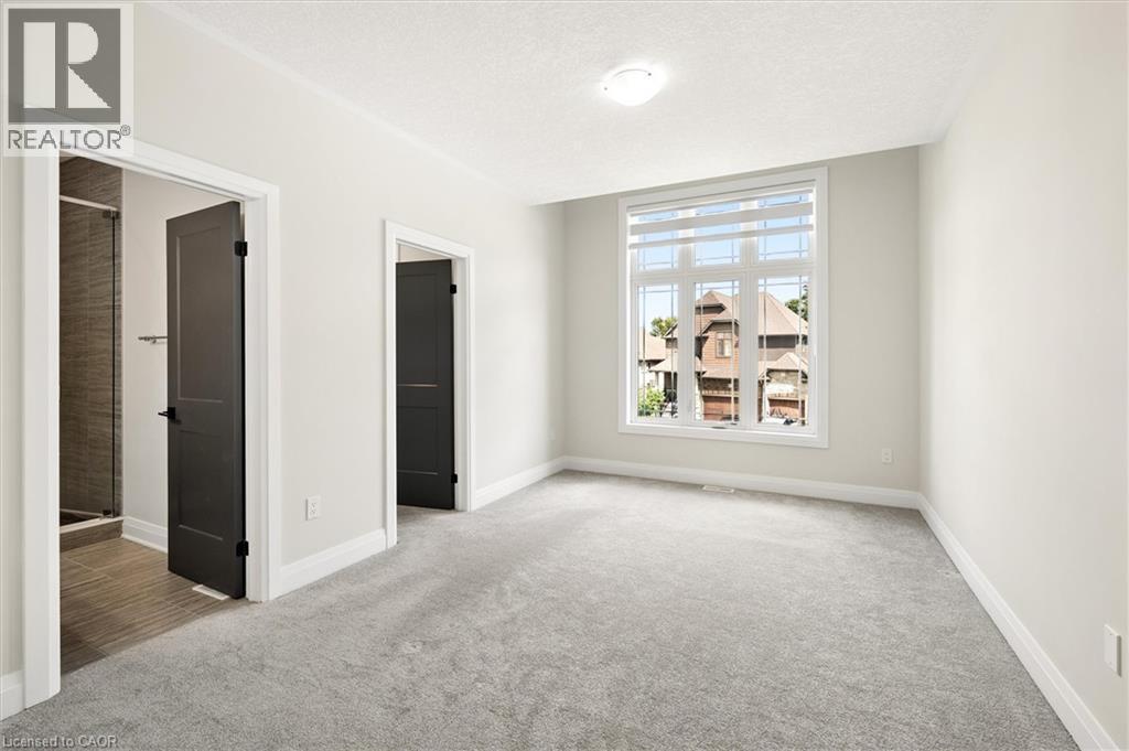 Primary Bedroom #2 - 163 Redtail Street, Kitchener, ON - Indoor Photo Showing Other Room