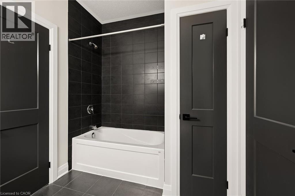 Jack and Jill ensuite connecting Bedrooms 3 and 4 - 163 Redtail Street, Kitchener, ON - Indoor Photo Showing Bathroom