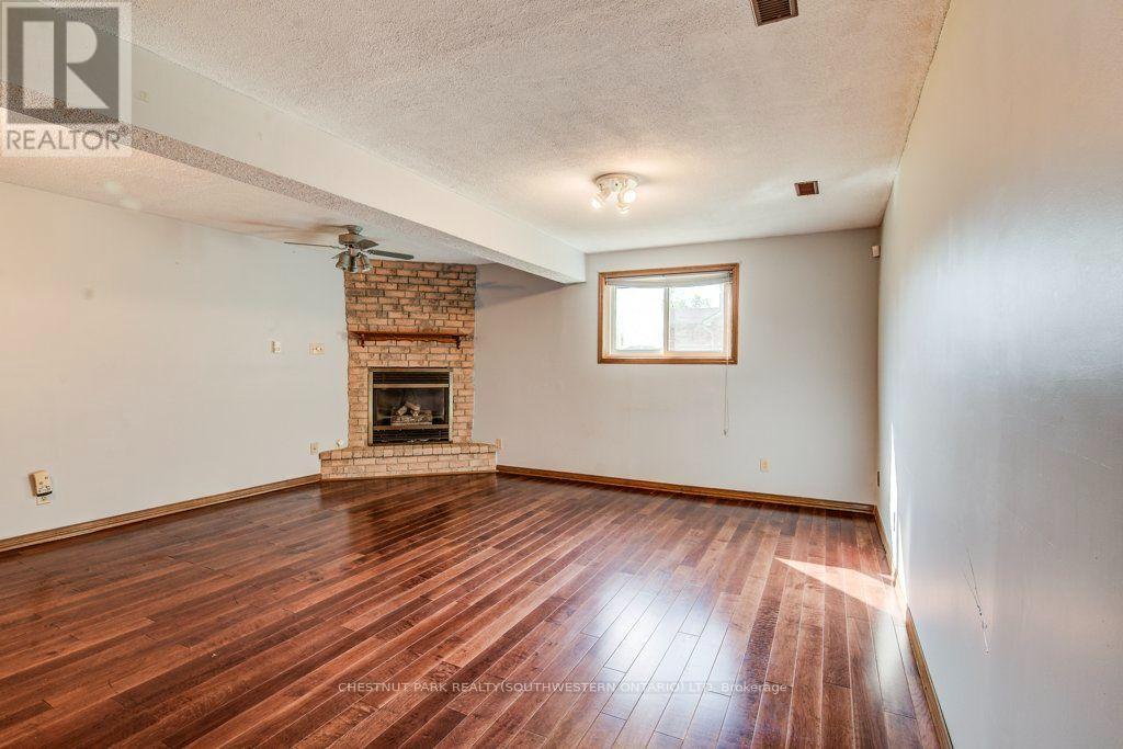 3 Cora Drive, Kitchener, ON - Indoor Photo Showing Other Room With Fireplace