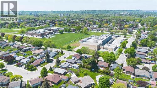 Aerial perspective showcasing a residential area with varied housing styles - 69 Nash Road S, Hamilton, ON 