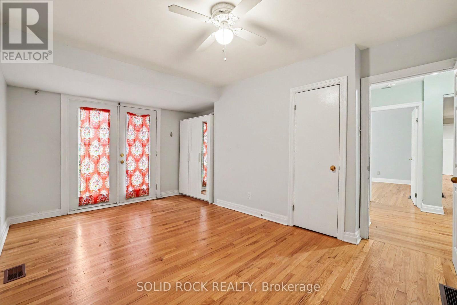 Primary bedroom with patio door - 889 Mountainview Avenue, Ottawa, ON