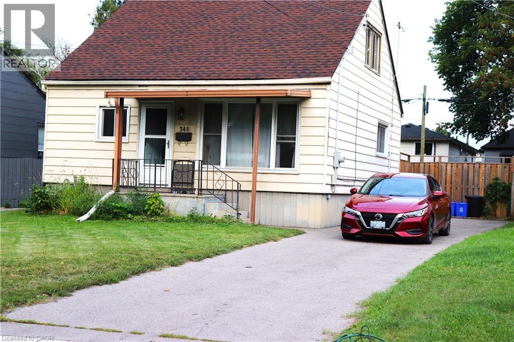 Long paved drive to fit 3 maybe 4 cars - 348 Weir Street N, Hamilton, ON