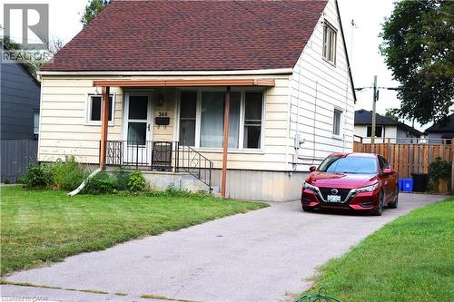 Long paved drive to fit 3 maybe 4 cars - 348 Weir Street N, Hamilton, ON 