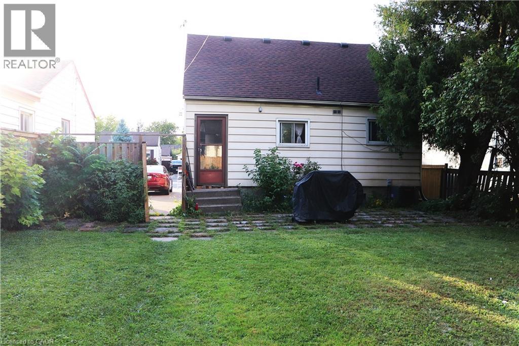 Rear of home with big trees for shade areas - 348 Weir Street N, Hamilton, ON