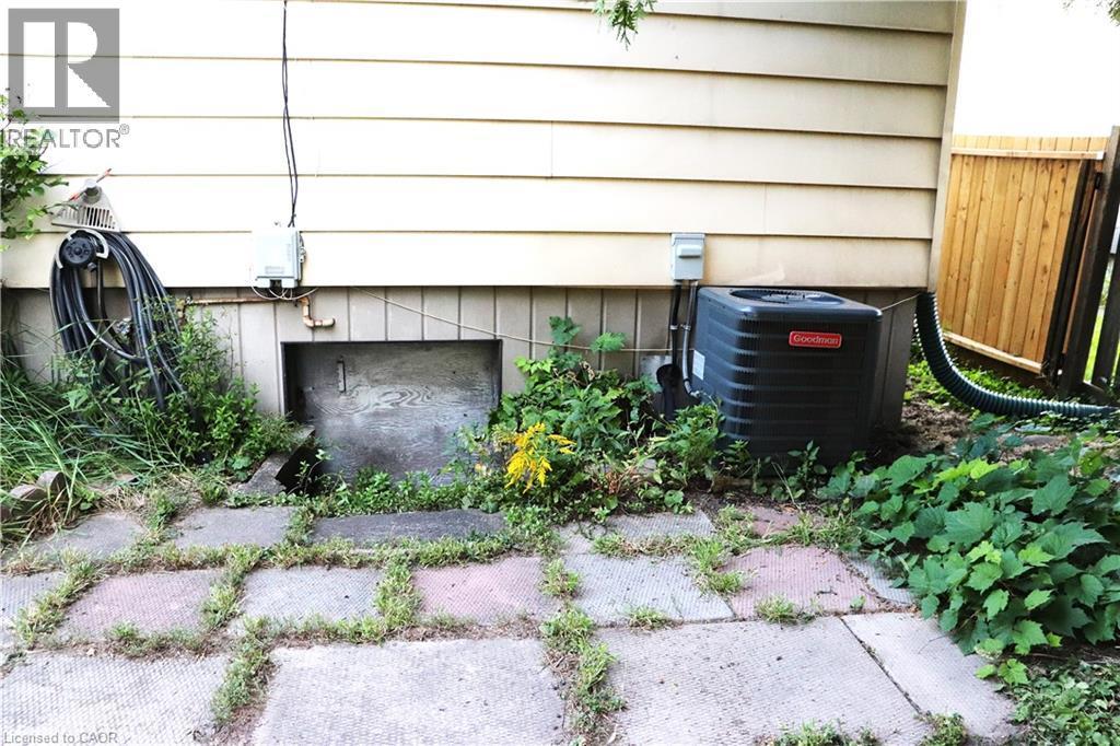 Entrance into crawl space furnace area. - 348 Weir Street N, Hamilton, ON