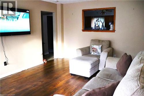 Laminate flooring in living room - 348 Weir Street N, Hamilton, ON 