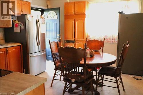 Large eat in kitchen area door leads to large fenced yard - 348 Weir Street N, Hamilton, ON 