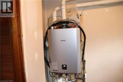 Hot water on demand located in main floor laundry room - 348 Weir Street N, Hamilton, ON 
