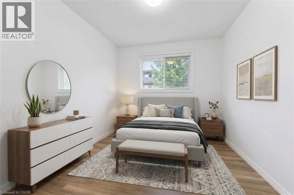 Bedroom #1 is virtually staged - 21 Vicmount Drive, Kitchener, ON