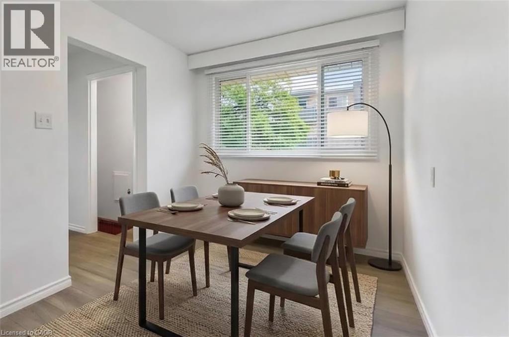 Virtually staged Dining area - 21 Vicmount Drive, Kitchener, ON