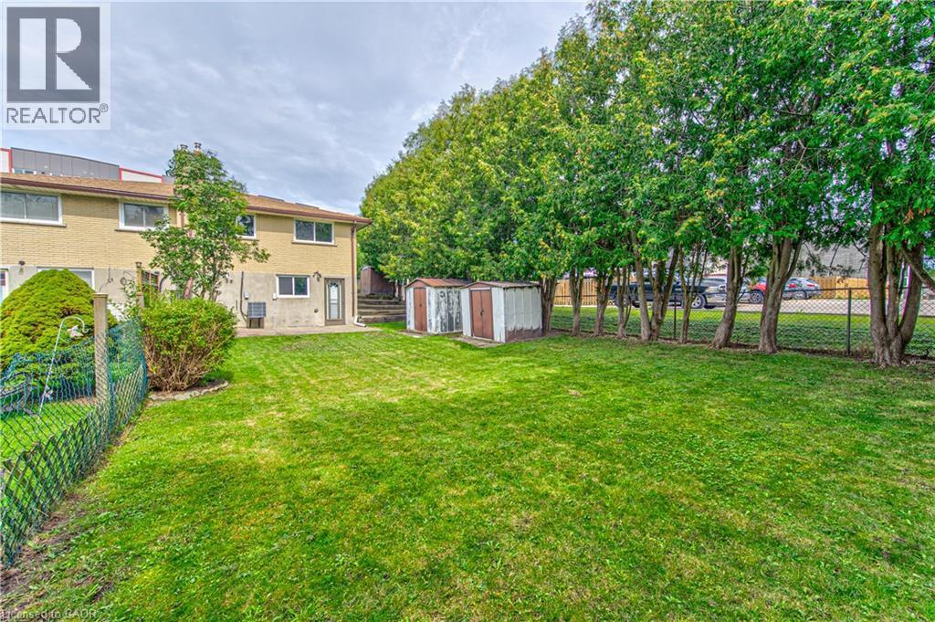 Major trees for additional privacy - 21 Vicmount Drive, Kitchener, ON