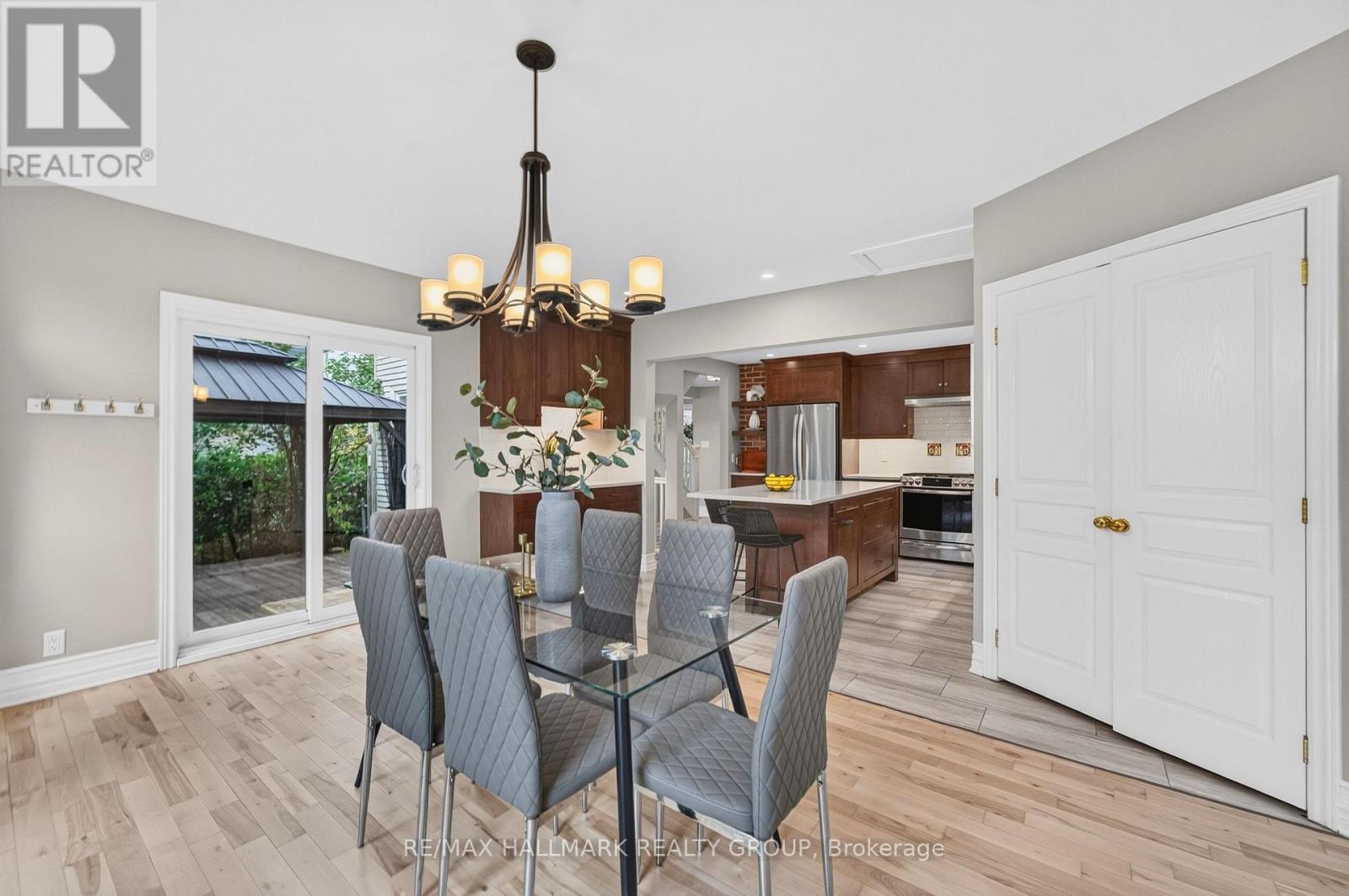 Dining room with patio door leading to outside. - 1608 Prince Of Wales Drive, Ottawa, ON