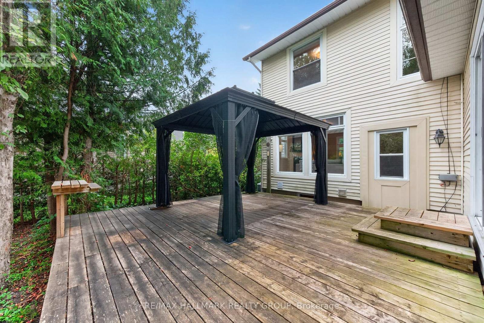 Gazebo will stay with lovely wrap around deck! - 1608 Prince Of Wales Drive, Ottawa, ON