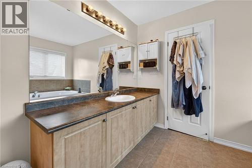 Full bath with vanity and tile patterned flooring - 97 Sirente Drive, Hamilton, ON 