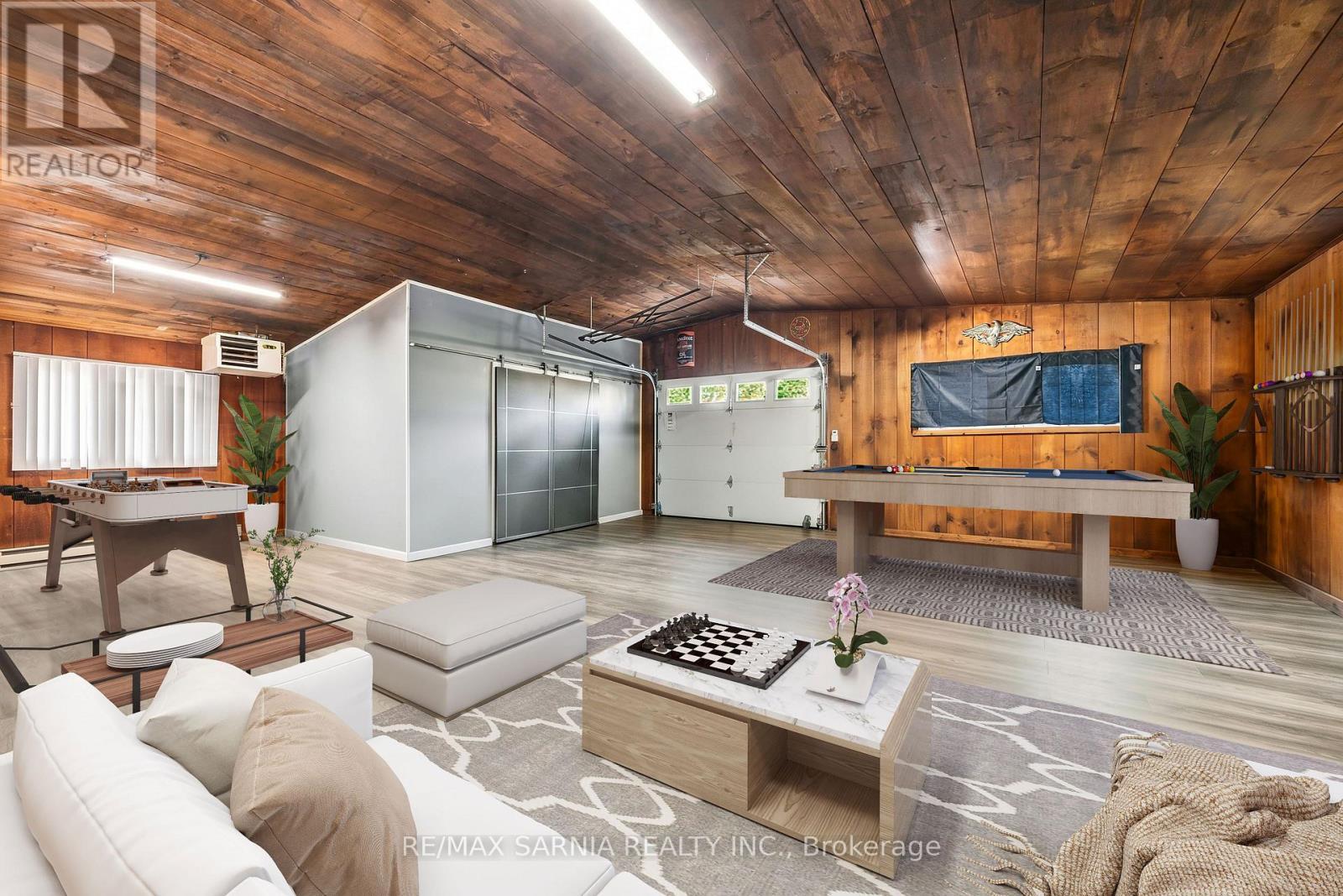 Virtually staged as main floor rec room/man cave - 1186 St. Clair Parkway, St. Clair, ON