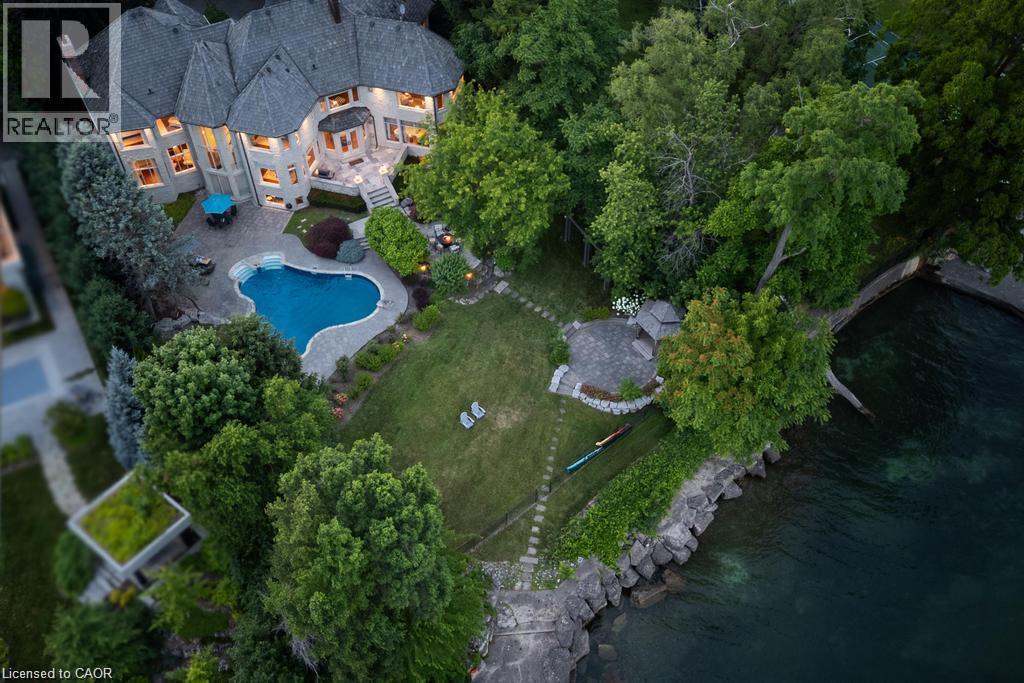 Stately multi-story residence with a complex roofline - 4038 Lakeshore Road, Burlington, ON