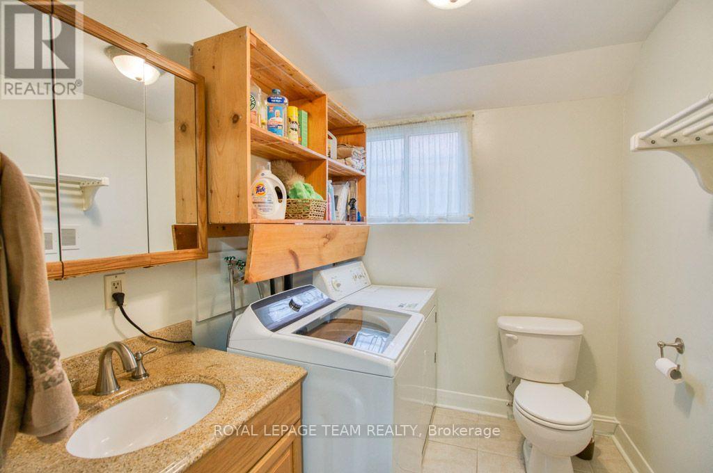 Laundry + 2pc bathroom on lower level - 220 Ancaster Avenue, Ottawa, ON