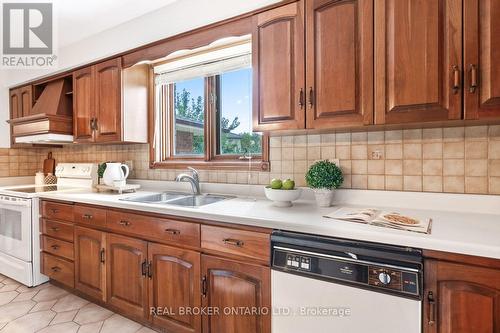 Solid wood cabinetry & overlooks the backyard - 86 Monte Drive, Hamilton, ON 