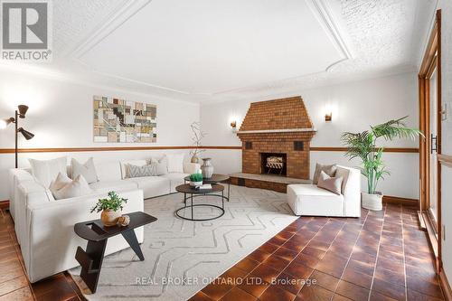 Family Room with large wood fireplace - 86 Monte Drive, Hamilton, ON 