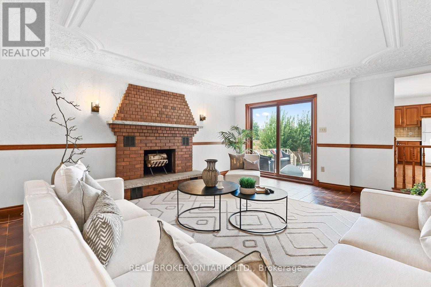 Walk out to the backyard from the Family Room - 86 Monte Drive, Hamilton, ON