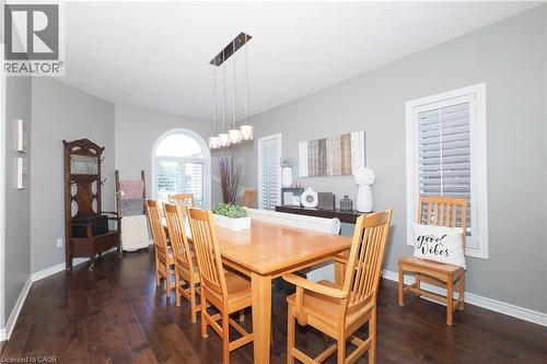 Dark wood-finish flooring with light gray walls - 1200 Dunbar Road, Cambridge, ON 