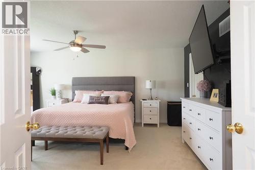 Carpeted flooring throughout, recessed lighting, and a ceiling fan with integrated lighting - 1200 Dunbar Road, Cambridge, ON 