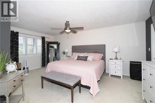 Light-colored carpeting, white walls, and a ceiling fan with integrated lighting - 1200 Dunbar Road, Cambridge, ON 