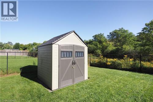 Storage shed with dual entry doors, gabled roof, and side windows - 1200 Dunbar Road, Cambridge, ON 