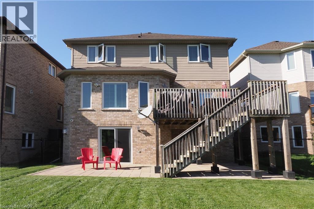 Brick and siding exterior with multiple windows - 1200 Dunbar Road, Cambridge, ON