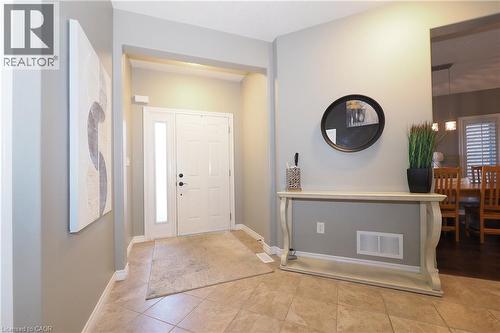 Entryway with tile flooring, a double front door, and a sidelight - 1200 Dunbar Road, Cambridge, ON 