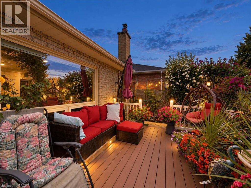 Expansive composite deck featuring integrated lighting - 1236 Thorpe Road, Burlington, ON