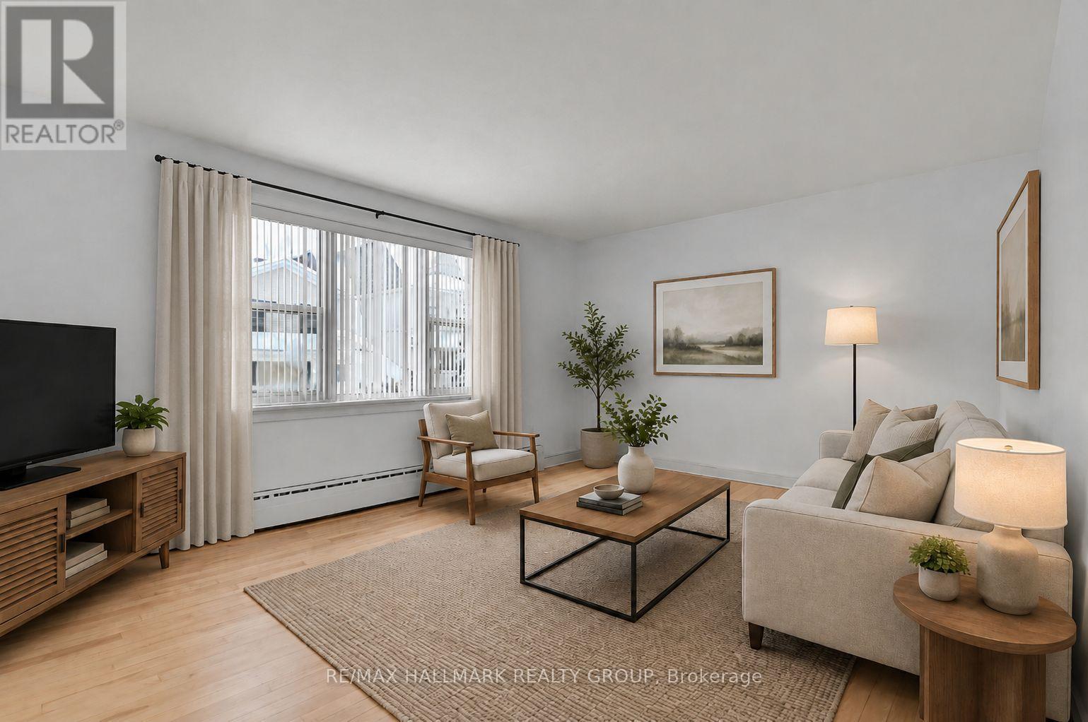 Apt 2 Main Level - Living Room (Virtually Staged) - 55 Ivy Crescent, Ottawa, ON