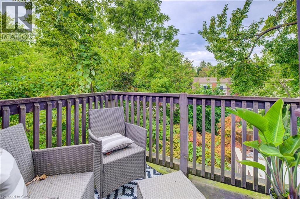 Outdoor deck with wood railings - 90 Brock Street, Kitchener, ON