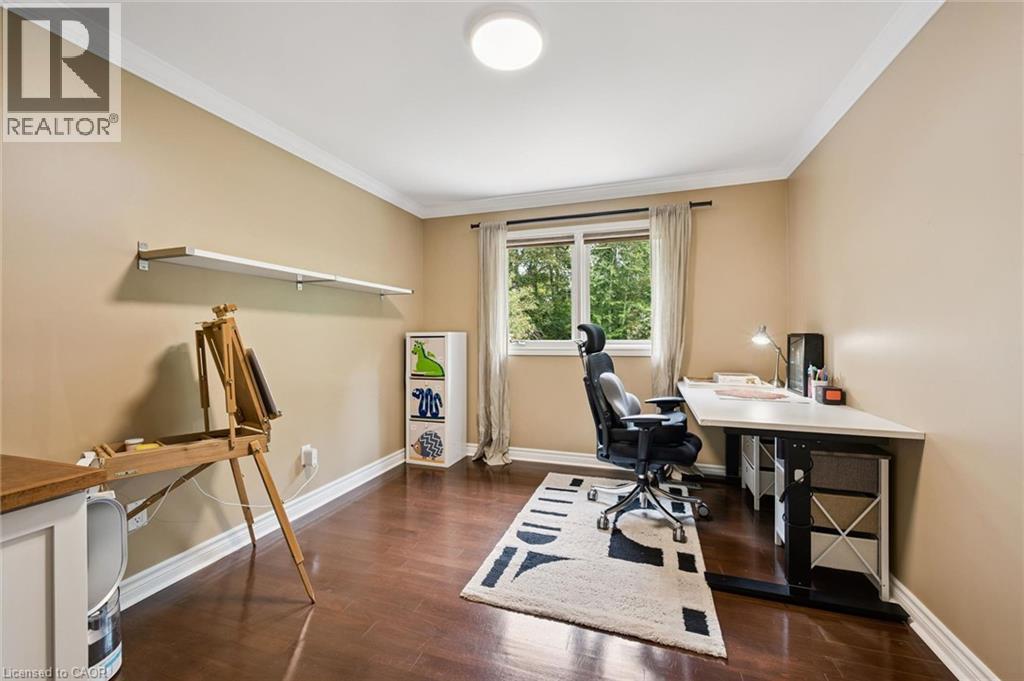 Wood-finish flooring with crown molding and recessed lighting - 334 Coleridge Drive, Waterloo, ON