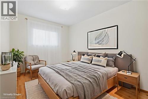 Hardwood-style flooring with a light color palette - 137 Picton Street E, Hamilton, ON 