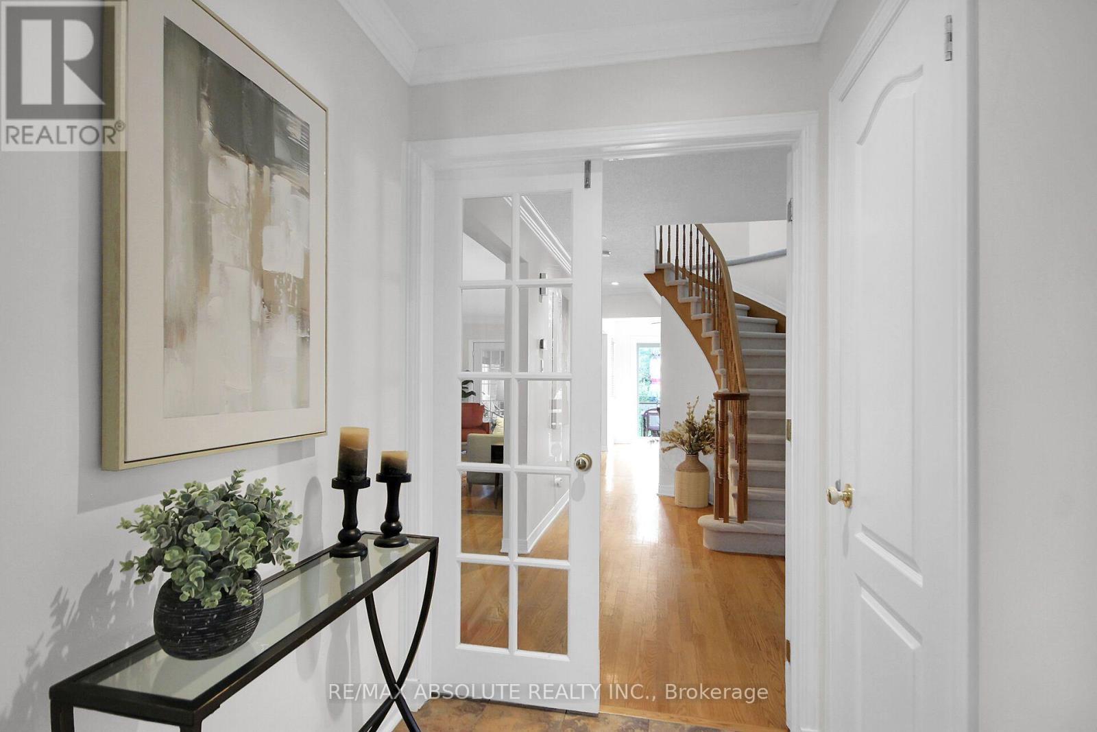 Welcoming Vestibule with Fench Doors - 38 Forestglade Crescent, Ottawa, ON