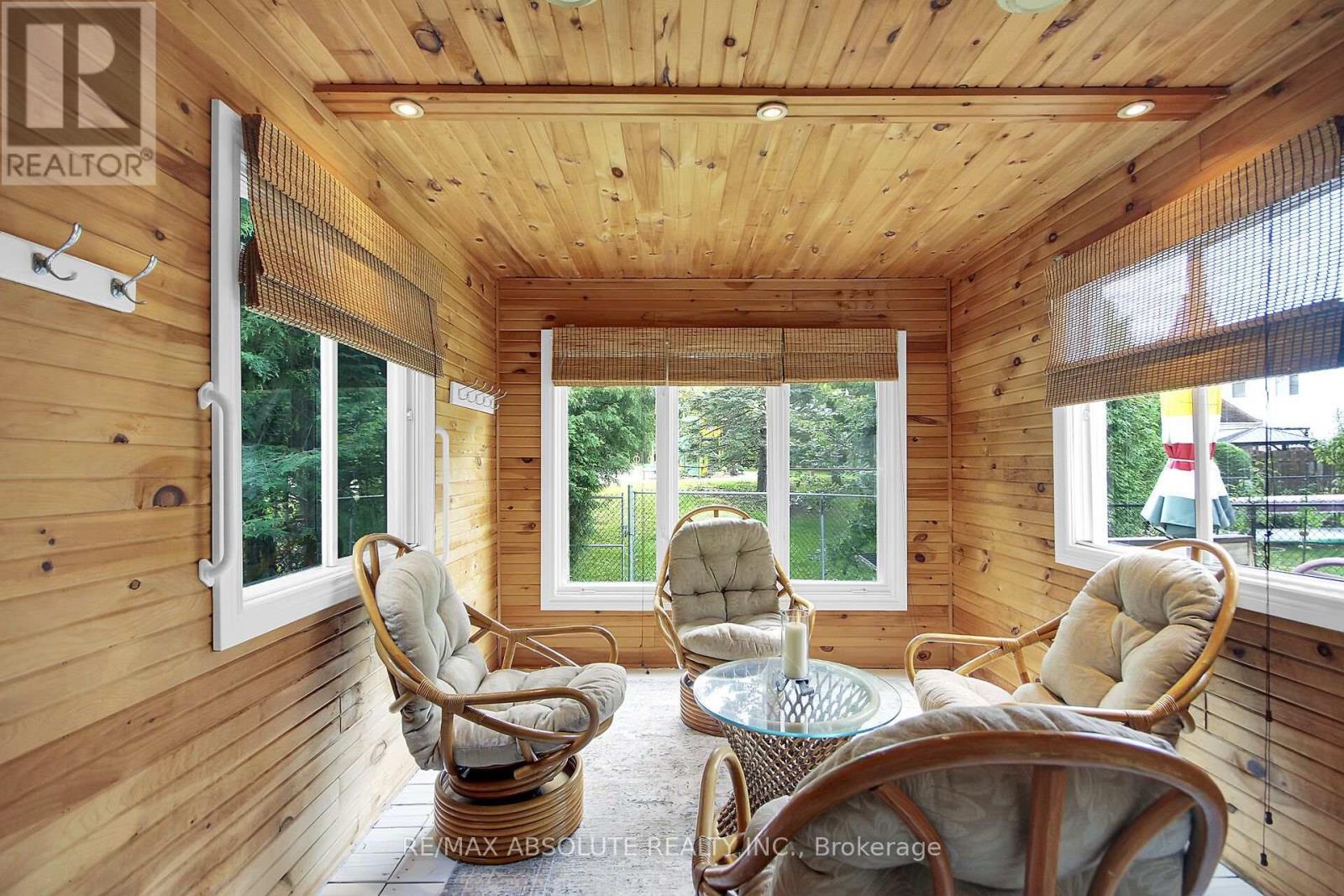 Sunroom has large windows - 38 Forestglade Crescent, Ottawa, ON